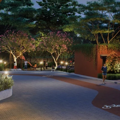 Tree-lined plaza with a cycle track at CKPC Heart of Harmony at dusk, developer render